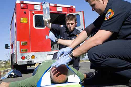 Card image AC EMS Students performing CPR on dummy