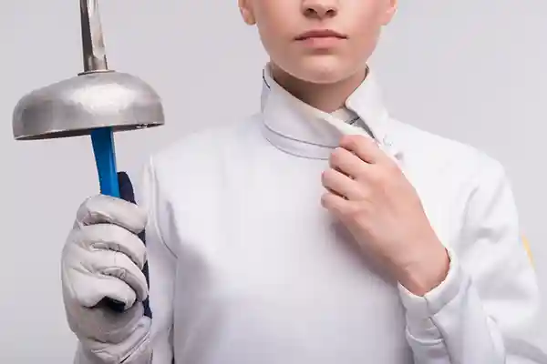 Fencing student with foil