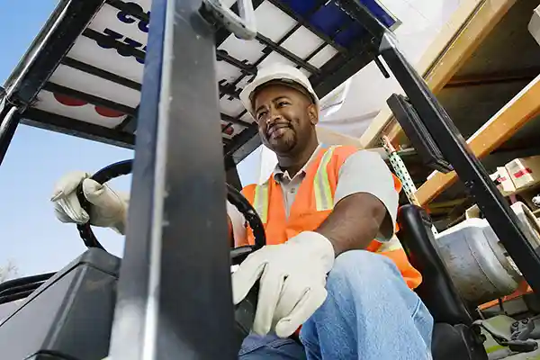 Aftrican American Male on Forklift