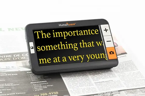 An Explorē 5 Pocket-Size Video Magnifier on white background.