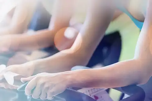 Fitness and Recreation - womens arms on exercise bikes