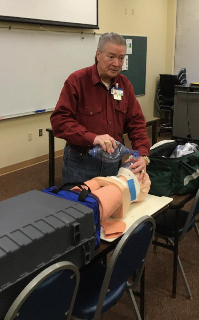 Paul Whitfield teaches class IN