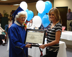 Evie Shows Off Certificate