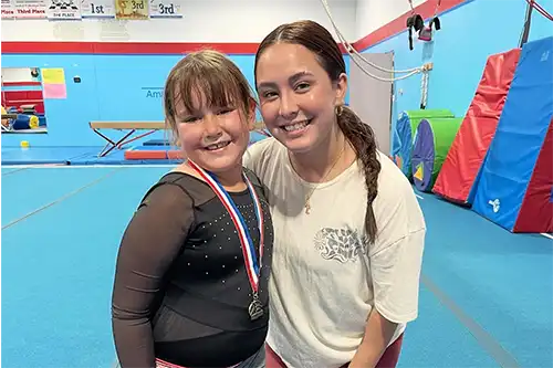 First slide 2 Young AC Gymnasts