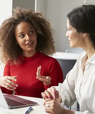 Female College Student with her Tutor